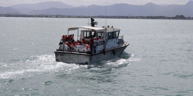 U.S. Coast Guard returns 309 men, women and children to Haiti after attempting to migrate to America by sea.