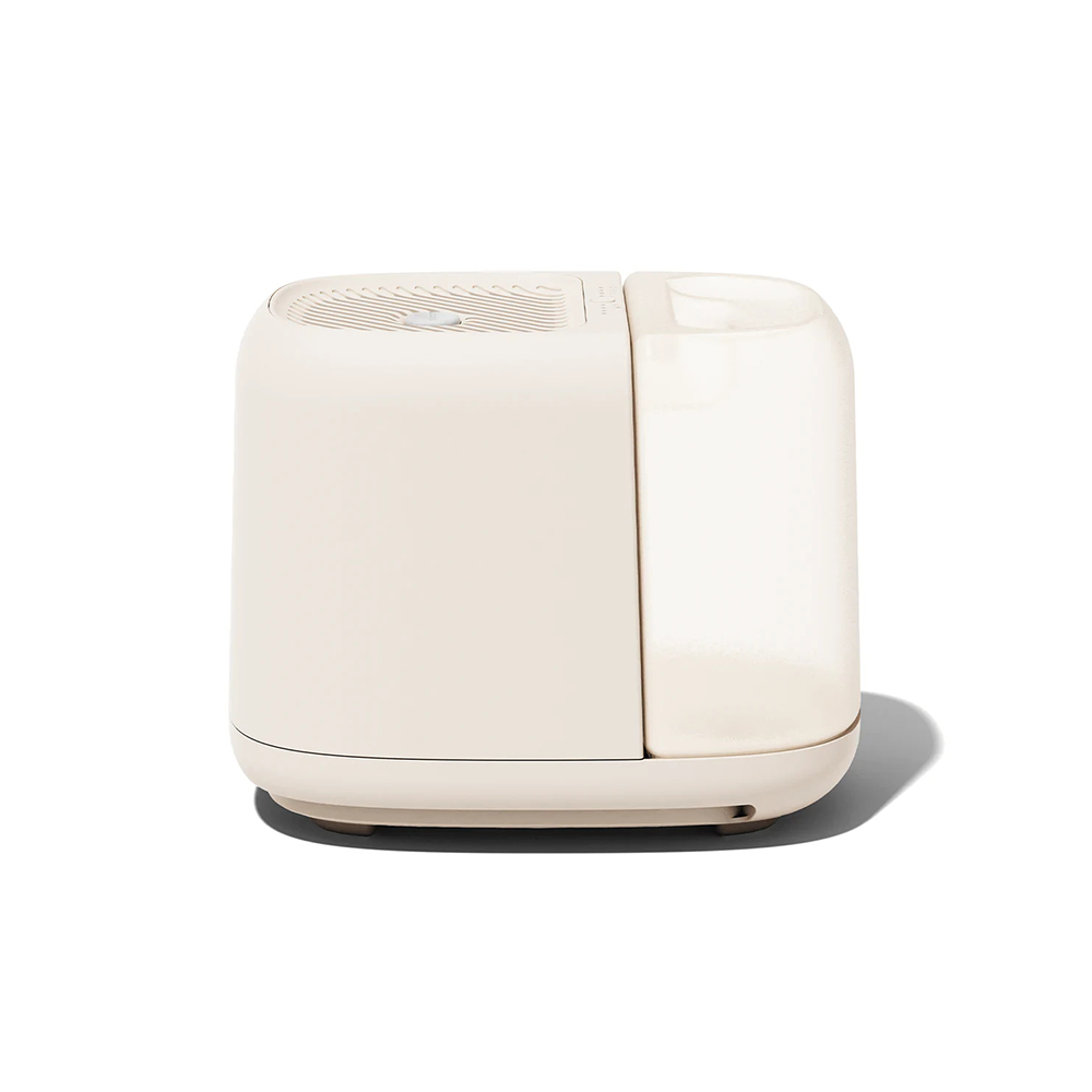Oatmeal-colored humidifier on white background