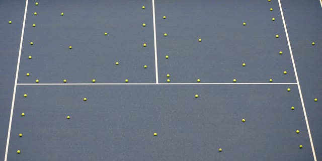 Tennis balls are seen during a practice session ahead of the Beijing 2008 Olympic Games August 6, 2008.   