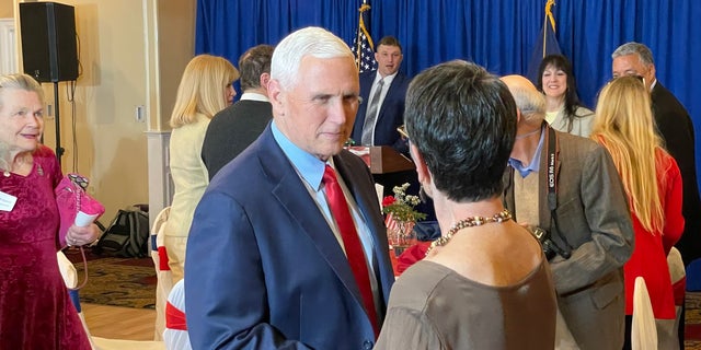 Former Vice President Mike Pence, a potential 2024 Republican presidential candidate, speaks with party activists in New Hampshire before keynoting the Cheshire County GOP annual Lincoln-Reagan fundraising dinner March 16, 2023, in Keene, N.H. 