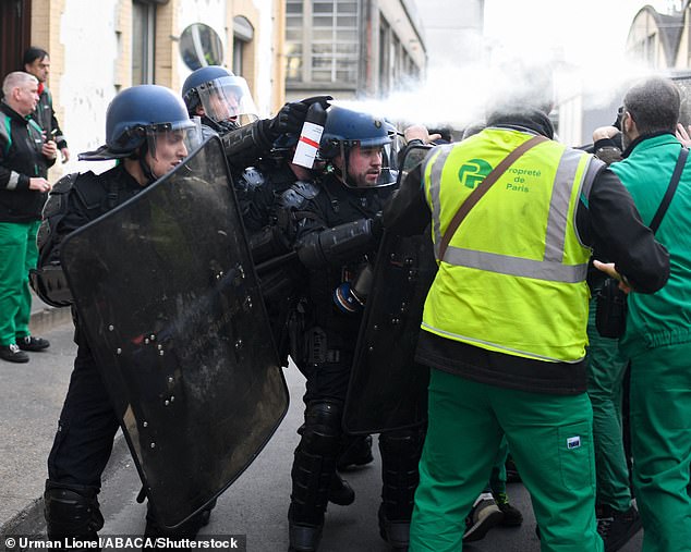 Fury has spread across the streets of Paris as police clash with protesters after a controversial bill to raise the retirement age was forced through parliament without a vote