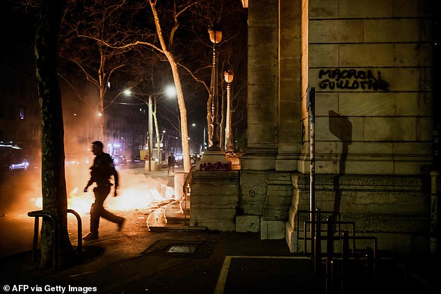 Protesters have ransacked and attempted to set fire to a town hall in Lyon, France, during violent protests against French President Emmanuel Macron's pension reforms today