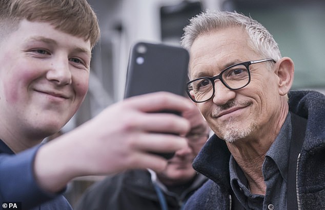 Gary Lineker posed for selfies with fans as he arrives at the Etihad Stadium in Manchester