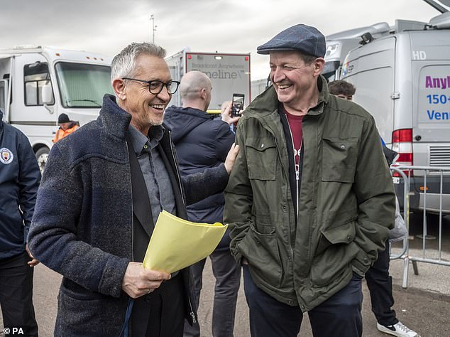 Gary Lineker (left) speaks to Alastair Campbell (right) as he arrives at the Etihad Stadium in Manchester to present live coverage of the FA Cup quarter-final between Manchester City and Burnley on the BBC