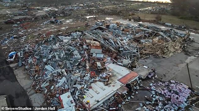 As dawn broke over Mississippi, the trail of destruction left by the powerful tornadoes lay bare