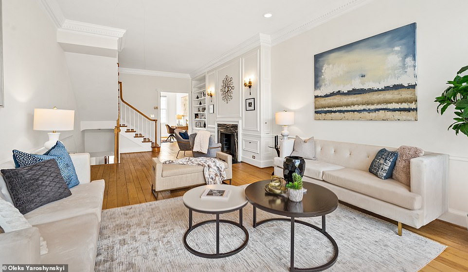 Photos from the Georgetown property's new listing show some of the home's original features have remained intact, including the staircase, honey-colored wood flooring, distinctive oak molding and sash windows