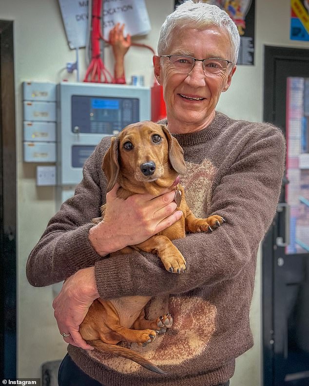 O'Grady was photographed with a Miniature Dachshund a few days before he passed away