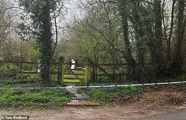 Police search teams and scenes of crime officers were in the couple's garden (pictured) and a mobile police station was set up next to St Mary and all saints church where Mrs Purdy was church warden