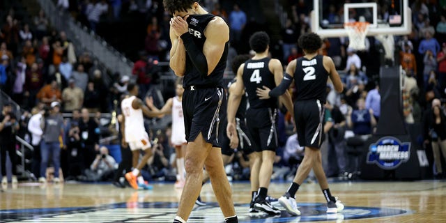 Colby Jones, #3 of the Xavier Musketeers, reacts to the score during the second half against the Texas Longhorns in the Sweet 16 round of the NCAA Men's Basketball Tournament at T-Mobile Center on March 24, 2023, in Kansas City, Missouri.