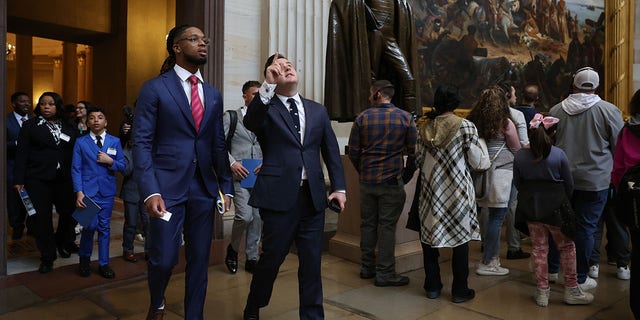 Buffalo Bills safety Damar Hamlin tours the U.S. Capitol prior to an event with lawmakers to introduce the Access to AEDs Act on March 29, 2023 in Washington, D.C.