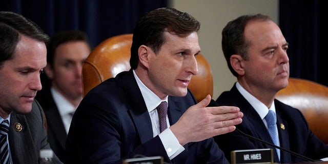 Attorney Daniel Goldman questions Ambassador Bill Taylor, charge d'affaires at the U.S. embassy in Ukraine, during a House Intelligence Committee impeachment inquiry hearing into President Donald Trump on Capitol Hill on Nov. 13, 2019.