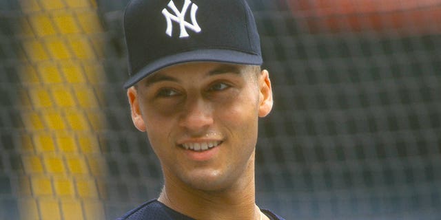 Derek Jeter, #2 of the New York Yankees, looks on during batting practice prior to the start of a Major League Baseball game circa 1995 at Yankee Stadium in the Bronx borough of New York City.