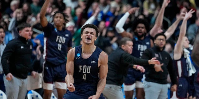 Fairleigh Dickinson guard Grant Singleton celebrates after a basket against Purdue during the men's NCAA Tournament in Columbus, Ohio, Friday, March 17, 2023.