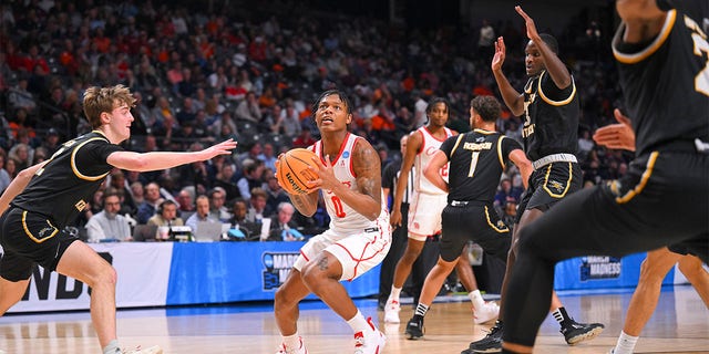 Marcus Sasser (0) of the Houston Cougars looks to shoot in the first half during the first round of the 2023 NCAA Tournament at Legacy Arena at the BJCC March 16, 2023, in Birmingham, Ala. 