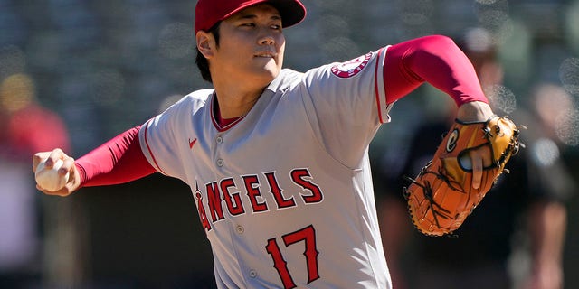 Shohei Ohtani, #17 of the Los Angeles Angels, pitches against the Oakland Athletics in the bottom of the first inning at RingCentral Coliseum on Oct. 5, 2022 in Oakland, California.