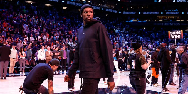 Kevin Durant of the Suns leaves the court after the Suns beat the Orlando Magic 116-113 at Footprint Center on March 16, 2023, in Phoenix, Arizona.