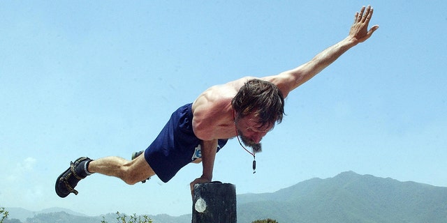 Dutchman Wim Hof, better known as "the Iceman" for his ability to withstand seemingly impossible levels of cold, demonstrates skills at a hotel in Kathmandu in May 2007. 