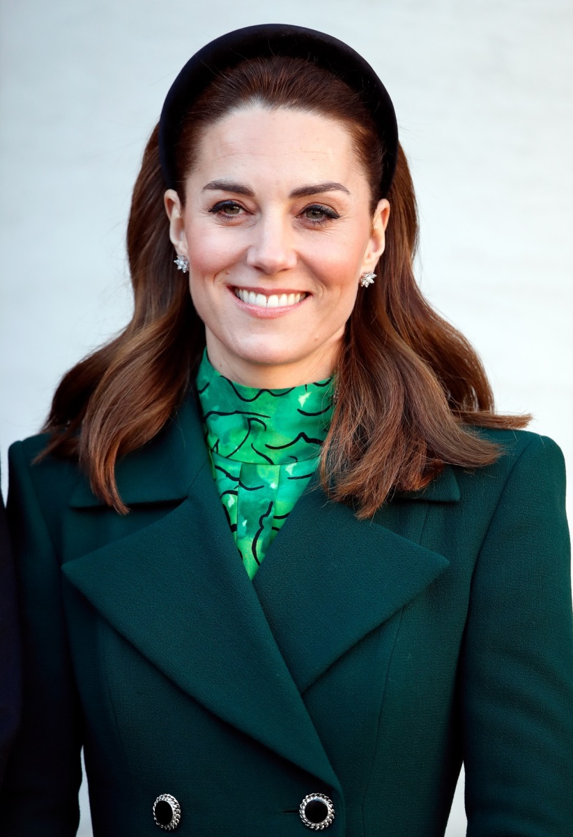 Kate Middleton wearing a headband and green outfit as she arrives at Government Buildings to meet Ireland's Taoiseach Leo Varadkar