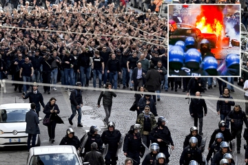 Cars set on fire as thugs clash with cops to overshadow Napoli vs Frankfurt