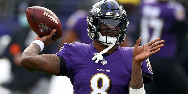 Quarterback Lamar Jackson, #8 of the Baltimore Ravens, warms up prior to their game against the Jacksonville Jaguars at M&amp;T Bank Stadium on Dec. 20, 2020 in Baltimore.