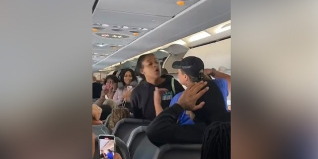The TikTok video from @KIR.AMORE shows Simone Bryna Kim arguing and threatening people on a Frontier flight that was heading to Philadelphia, Pennsylvania from the Miami International Airport.