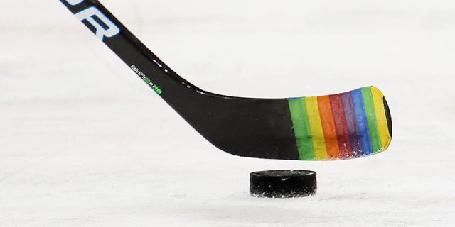 Zac Jones, #6 of the New York Rangers, skates with a stick decorated for "Pride Night" in warm-ups prior to the game against the Washington Capitals at Madison Square Garden on May 3, 2021 in New York City.