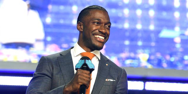 Robert Griffin III speaks onstage during round four of the 2022 NFL Draft on April 30, 2022, in Las Vegas, Nevada. (Photo by David Becker/Getty Images)
