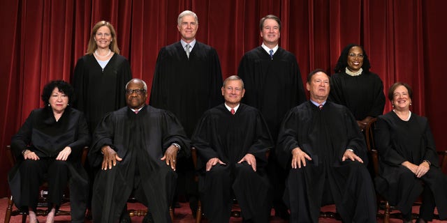 United States Supreme Court (front row L-R) Associate Justice Sonia Sotomayor, Associate Justice Clarence Thomas, Chief Justice of the United States John Roberts, Associate Justice Samuel Alito, and Associate Justice Elena Kagan, (back row L-R) Associate Justice Amy Coney Barrett, Associate Justice Neil Gorsuch, Associate Justice Brett Kavanaugh and Associate Justice Ketanji Brown Jackson pose for their official portrait at the East Conference Room of the Supreme Court building on Oct. 7, 2022, in Washington, D.C.