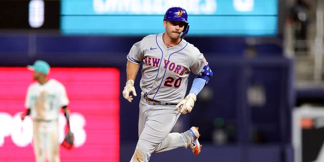 Pete Alonso of the New York Mets rounds the bases after hitting a home run against the Miami Marlins during the ninth inning at loanDepot park March 31, 2023, in Miami, Fla.