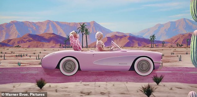 Road trip: While Barbie drove through the desert and towards the real world, she was surprised by Ken, who revealed that he would be accompanying her on the journey