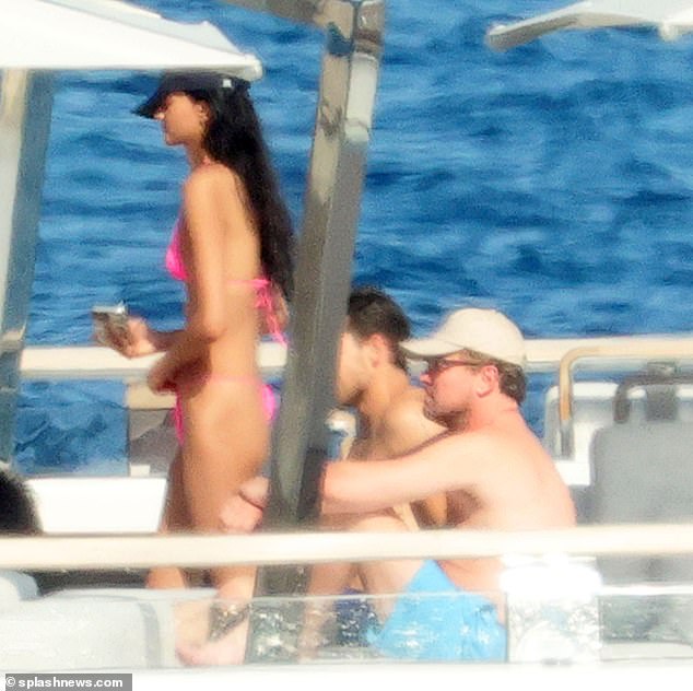 Stunner: The  gorgeous brunette beauty flaunted her jaw-dropping figure in a hot pink thong bikini