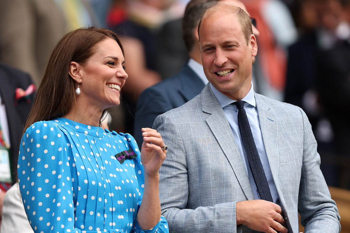 Kate Middleton, who Prince William is 'lucky' to have married, according to author Tom Quinn, laughs with Prince William