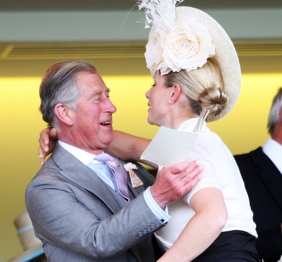 King Charles III and Zara Tindall in a warm embrace