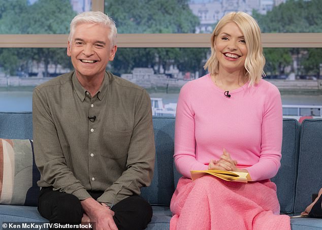 The calm before the storm: Phillip and Holly on the sofa of ITV's This Morning last month, on May 11