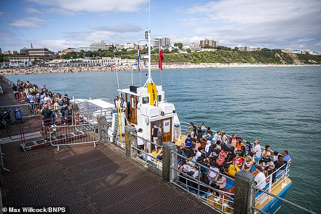The Dorset Belle pictured packed with tourists next to Bournemouth Pier in August 2021