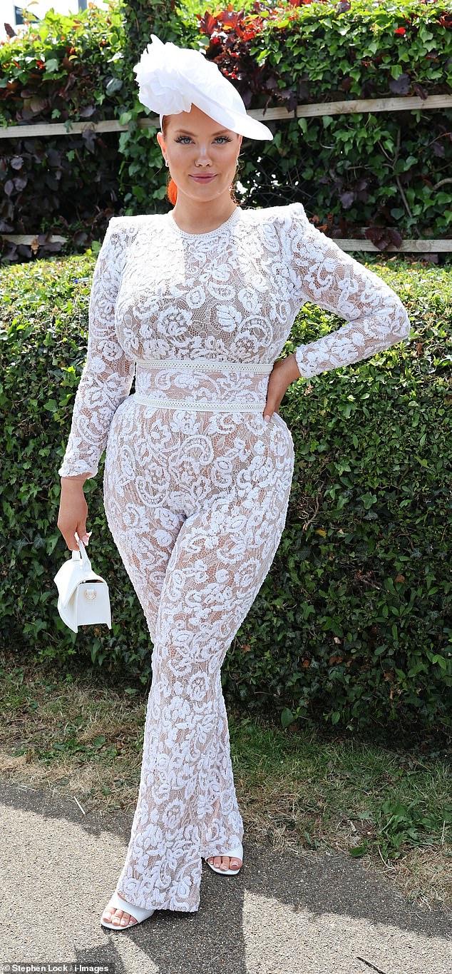 Lovely in lace! This guest looked elegant in a white lace jumpsuit which was belted at the waist, paired with a wide-brimmed fascinator