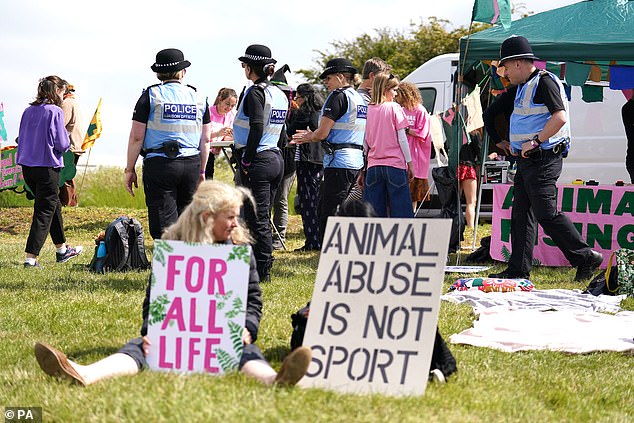Activists held signs with slogans such as: 'Animal abuse is not sport'