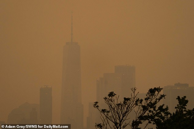 A hazy view of Manhattan from Brooklyn as smoke from Canadian wildfires fills the city