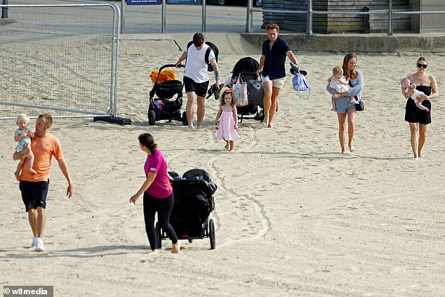 BOURNEMOUTH: Revellers head to the beach as hot weather spreads across Britain