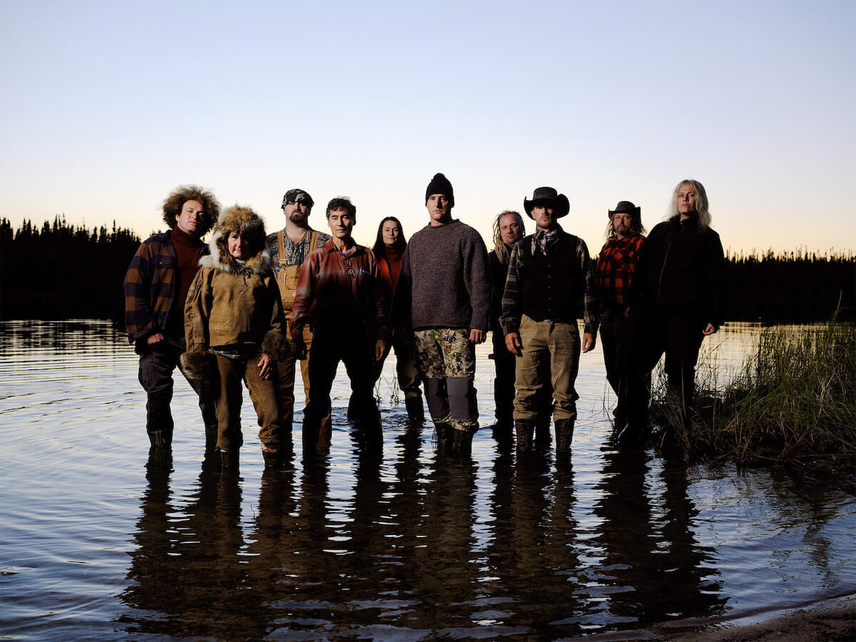 Photo of the 'Alone' Season 10 cast standing in water