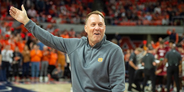 Hugh Freeze appears at an Auburn Tigers basketball game