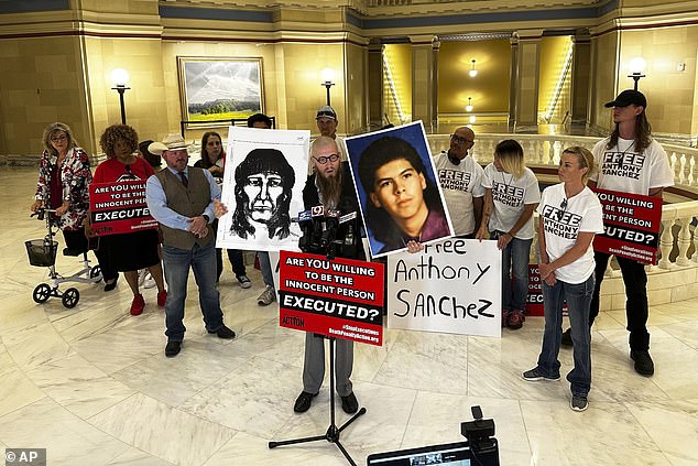 Supporters of Oklahoma death row inmate Anthony Sanchez proclaim his innocence during a news conference at the Oklahoma Capitol in Oklahoma City, May 25, 2023