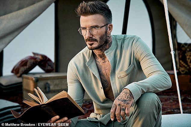 David Beckham wears his latest creations to promote his new range of specs