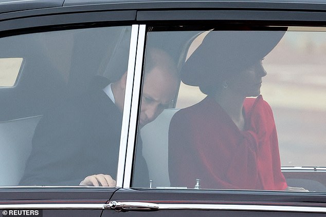 Kate Middleton looked chic in a red coat dress from Catherine Walker as she joined her husband Prince William to meet the president of South Korea today