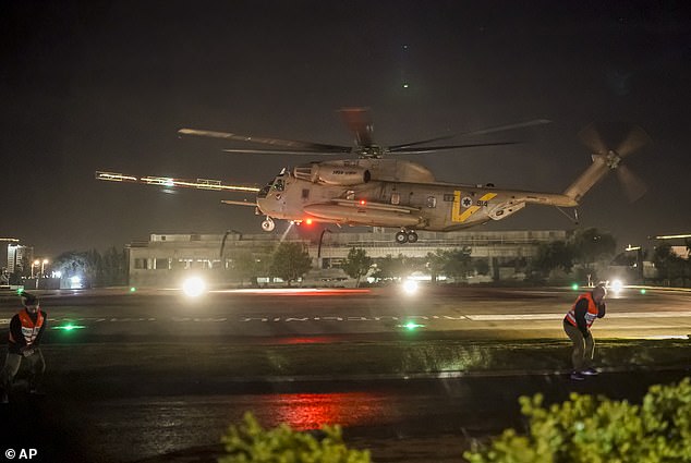 A helicopter carrying Israeli hostages released by Hamas lands at the Sheba Medical Center in Ramat Gan