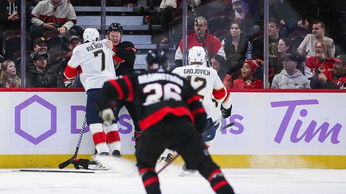 Ottawa Senators players get into a scrum