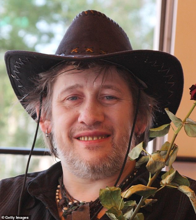 MacGowan with his new set of teeth in Spain in 2009 - MacGowan was long known for having bad teeth after years of neglect. He lost his natural teeth in 2008 and wore fake teeth before getting a new set fitted in 2015.