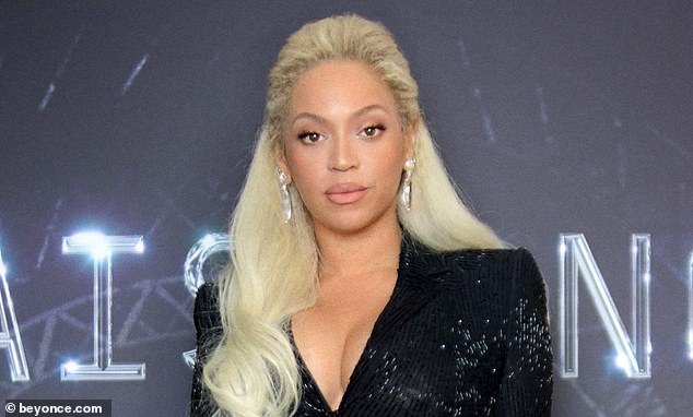 Beyonce was still rocking platinum blonde tresses ¿ which she debuted over the weekend ¿ styled into an elegant half up, half down look