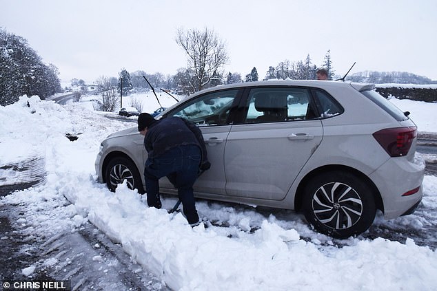 Heavy snowfall in Cumbria brought the county to a standstill over the weekend, with motorists having to dig their cars out of the snow