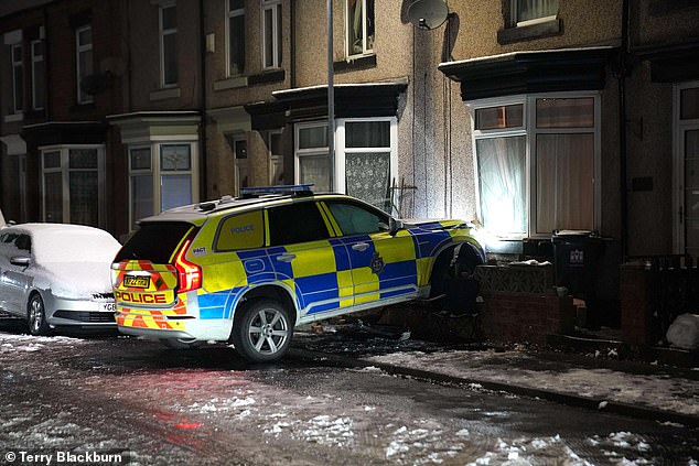 A police car in Darlington, Co Durham, smashed into the front of a house on Sunday evening